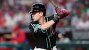 Sep 20, 2025; Phoenix, Arizona, USA; Arizona Diamondbacks outfielder Corbin Carroll (7) bats against the Philadelphia Phillies during the third inning at Chase Field. Mandatory Credit: Joe Camporeale-Imagn Images