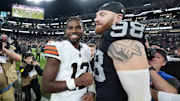 Nov 23, 2025; Paradise, Nevada, USA; Las Vegas Raiders defensive end Maxx Crosby (98) and Cleveland Browns quarterback Shedeur Sanders (12) embrace after the game at Allegiant Stadium. Mandatory Credit: Kirby Lee-Imagn Images