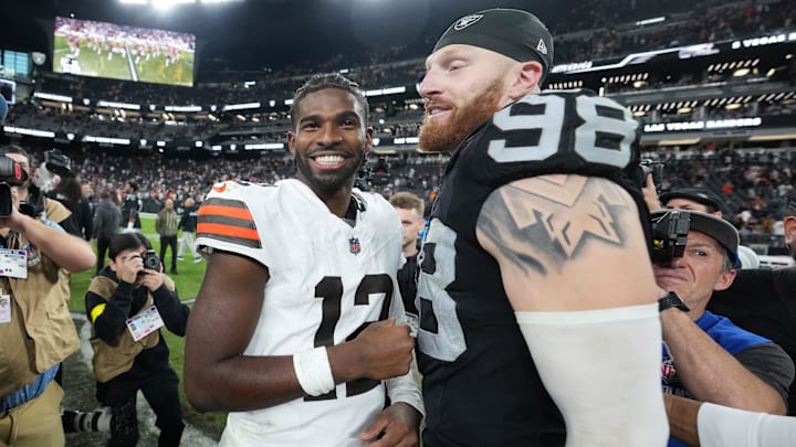 Nov 23, 2025; Paradise, Nevada, USA; Las Vegas Raiders defensive end Maxx Crosby (98) and Cleveland Browns quarterback Shedeur Sanders (12) embrace after the game at Allegiant Stadium. Mandatory Credit: Kirby Lee-Imagn Images Nov 23, 2025; Paradise, Nevada, USA; Las Vegas Raiders defensive end Maxx Crosby (98) and Cleveland Browns quarterback Shedeur Sanders (12) embrace after the game at Allegiant Stadium. Mandatory Credit: Kirby Lee-Imagn Images
