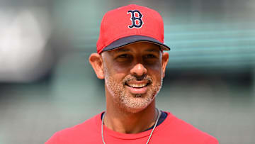 Aug 14, 2024; Boston, Massachusetts, USA; Boston Red Sox manager Alex Cora walks onto the field before a game against the Texas Rangers at Fenway Park.