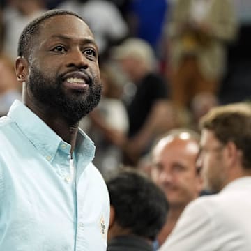 Aug 6, 2024; Paris, France; Dwyane Wade looks on at halftime between France and Canada in a men’s basketball quarterfinal game during the Paris 2024 Olympic Summer Games at Accor Arena. Mandatory Credit: Kyle Terada-Imagn Images