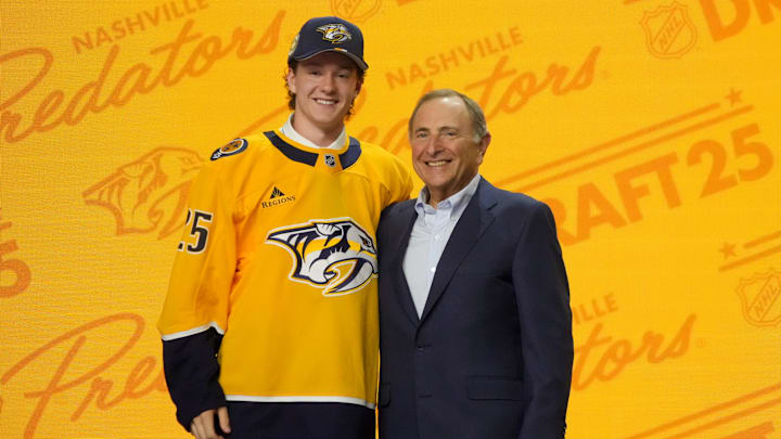 Jun 27, 2025; Los Angeles, California, USA; Cameron Reid is selected as the 21st overall pick to the Nashville Predators in the first round of the 2025 NHL Draft at Peacock Theater. Mandatory Credit: Kirby Lee-Imagn Images