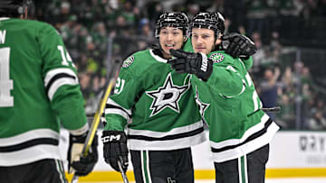 Dec 14, 2024; Dallas, Texas, USA; Dallas Stars left wing Jason Robertson (21) and center Roope Hintz (24) celebrates a goal scored by Robertson against the St. Louis Blues during the second period at American Airlines Center. Mandatory Credit: Jerome Miron-Imagn Images