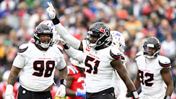 Oct 13, 2024; Foxborough, Massachusetts, USA; Houston Texans defensive end Will Anderson Jr. (51) celebrates with defensive tackle Tim Settle Jr. (98) after a sack against the New England Patriots at Gillette Stadium.