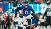 New York Giants Brian Burns sacks Philadelphia Eagles quarterback Jalen Hurts (1) during a Thursday Night Football game between the New York Giants and the Philadelphia Eagles at MetLife Stadium in East Rutherford on Oct. 9, 2025.