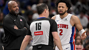 Detroit Pistons guard Cade Cunningham (2) and head coach J.B. Bickerstaff react to a technical foul call by referee David Guthrie (16) during the second half against the Dallas Mavericks at the American Airlines Center.