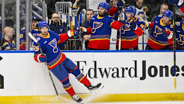 Dec 15, 2024; St. Louis, Missouri, USA;  St. Louis Blues center Jordan Kyrou (25) celebrates after scoring against the New York Rangers during the second period at Enterprise Center. Mandatory Credit: Jeff Curry-Imagn Images