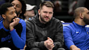 Jan 27, 2025; Dallas, Texas, USA; Dallas Mavericks guard Luka Doncic looks on from the team bench during the second quarter against the Washington Wizards at the American Airlines Center. Mandatory Credit: Jerome Miron-Imagn Images