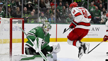 Feb 13, 2024; Dallas, Texas, USA; Carolina Hurricanes left wing Michael Bunting (58) leaps in front