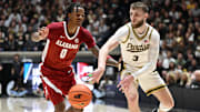 Purdue Boilermakers guard Braden Smith (3) passes the ball around Alabama Crimson Tide guard Labaron Philon (0) 
