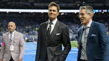 Tom Brady acknowledges fans as he walks into the tunnel before the NFC divisional round between Detroit Lions and Washington Commanders at Ford Field in Detroit on Saturday, Jan. 18, 2025.
