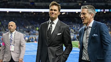 Tom Brady acknowledges fans as he walks into the tunnel before the NFC divisional round between Detroit Lions and Washington Commanders at Ford Field in Detroit on Saturday, Jan. 18, 2025.