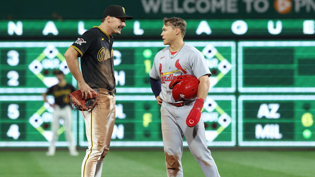 Apr 29, 2026; Pittsburgh, Pennsylvania, USA;  Pittsburgh Pirates shortstop Konnor Griffin (left) and St. Louis Cardinals second baseman JJ Wetherholt (right) talk at second base during a replay review in the ninth inning at PNC Park. Mandatory Credit: Charles LeClaire-Imagn Images