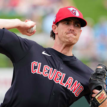 Mar 12, 2024; Surprise, Arizona, USA; Cleveland Guardians starting pitcher Shane Bieber (57) bats against the Texas Rangers during the second inning at Surprise Stadium. Mandatory Credit: Joe Camporeale-Imagn Images