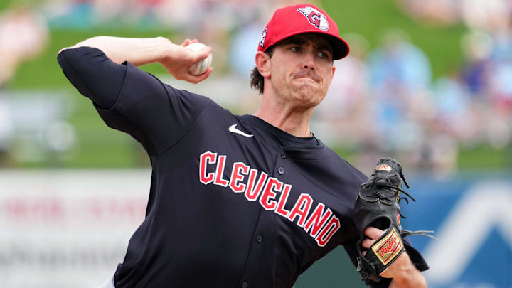 Mar 12, 2024; Surprise, Arizona, USA; Cleveland Guardians starting pitcher Shane Bieber (57) bats against the Texas Rangers during the second inning at Surprise Stadium.