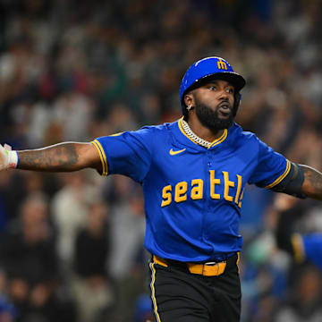 Seattle Mariners designated hitter Randy Arozarena celebrates after hitting a walk-off single against the Texas Rangers on Saturday at T-Mobile Park.