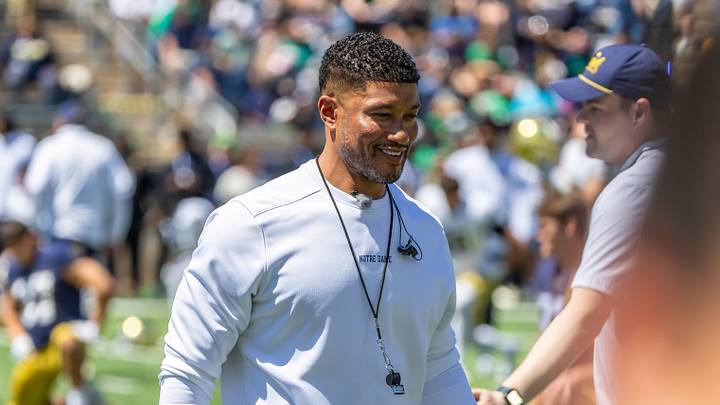 Apr 25, 2026; Notre Dame, IN, USA; Notre Dame Fighting Irish head coach Marcus Freeman greets players before the Blue-Gold game at Notre Dame Stadium. Mandatory Credit: Michael Caterina-Imagn Images