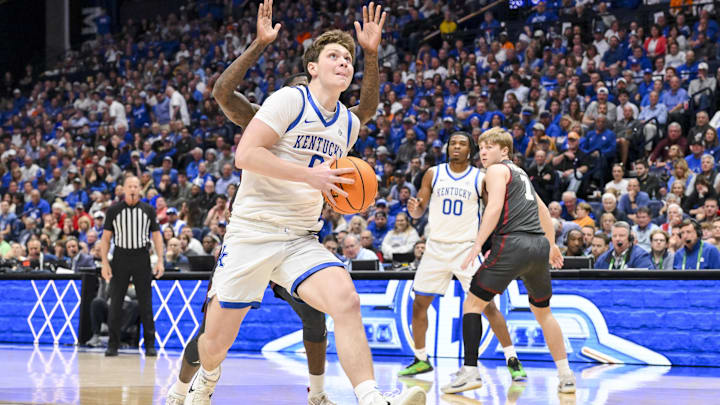 Mar 13, 2025; Nashville, TN, USA;  Kentucky Wildcats forward Trent Noah (9) drives to the basket against the Oklahoma Sooners during the first half at Bridgestone Arena. Mandatory Credit: Steve Roberts-Imagn Images