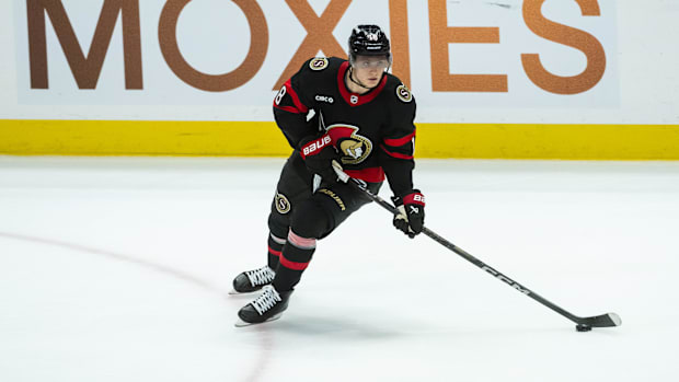 Hockey player in black unifor