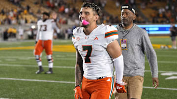 Oct 5, 2024; Berkeley, California, USA; Miami Hurricanes wide receiver Xavier Restrepo (7) celebrates after defeating the California Golden Bears at California Memorial Stadium. Mandatory Credit: Darren Yamashita-Imagn Images