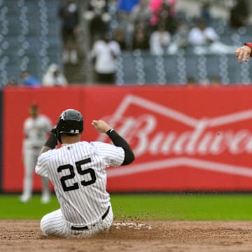 Sep 25, 2023; Bronx, New York, USA; Arizona Diamondbacks shortstop Jordan Lawlar (10) gets a force out against New York Yankees second baseman Gleyber Torres (25) during the sixth inning at Yankee Stadium. Mandatory Credit: John Jones-Imagn Images