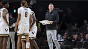 Nov 20, 2025; Nashville, Tennessee, USA;  Vanderbilt Commodores head coach Mark Byington looks down court against the Texas Southern Tigers during the first half at Memorial Gymnasium. Mandatory Credit: Steve Roberts-Imagn Images