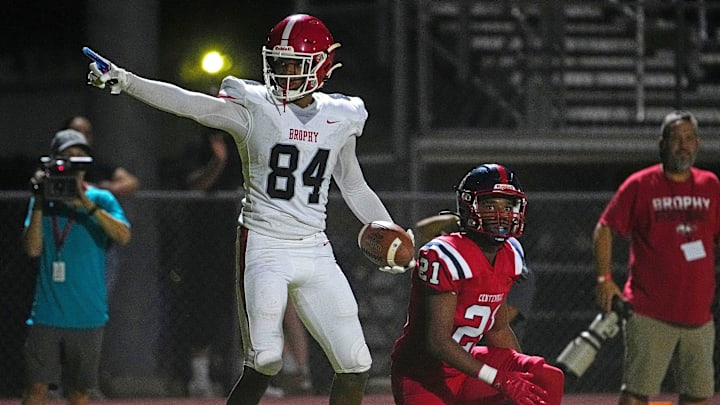 Brophy Prep wide receiver Daylen Sharper (84) celebrates a first down against Centennial during a game at Centennial High School on Sept. 13, 2024.
