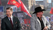 ESPN College GameDay host Rece Davis and analyst Pat McAfee laugh during the live broadcast on the Texas Tech University campus in Lubbock, Texas.