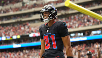 Oct 26, 2025; Houston, Texas, USA; Houston Texans wide receiver Jayden Higgins (81) reacts after catching a pass for a touchdown during the second quarter against the San Francisco 49ers at NRG Stadium. 