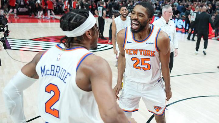 Mar 12, 2025; Portland, Oregon, USA; New York Knicks small forward Mikal Bridges (25) celebrates with point guard Miles McBride (2) after the game against the Portland Trail Blazers at Moda Center. Mandatory Credit: Soobum Im-Imagn Images