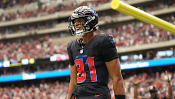 Oct 26, 2025; Houston, Texas, USA; Houston Texans wide receiver Jayden Higgins (81) reacts after catching a pass for a touchdown during the second quarter against the San Francisco 49ers at NRG Stadium.