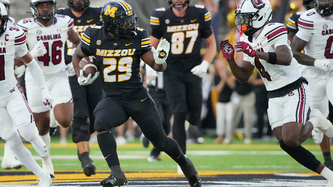 Missouri Tigers running back Ahmad Hardy (29) runs the ball in a game against the South Carolina Gamecocks this season.