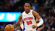 Dec 28, 2024; Denver, Colorado, USA; Detroit Pistons forward Ronald Holland II (00) dribbles up court in the second half against the Denver Nuggets at Ball Arena. Mandatory Credit: Ron Chenoy-Imagn Images