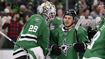Jan 24, 2025; Dallas, Texas, USA; Dallas Stars goaltender Jake Oettinger (29) and center Logan Stankoven (11) celebrate the win over the Vegas Golden Knights at the American Airlines Center. Mandatory Credit: Jerome Miron-Imagn Images