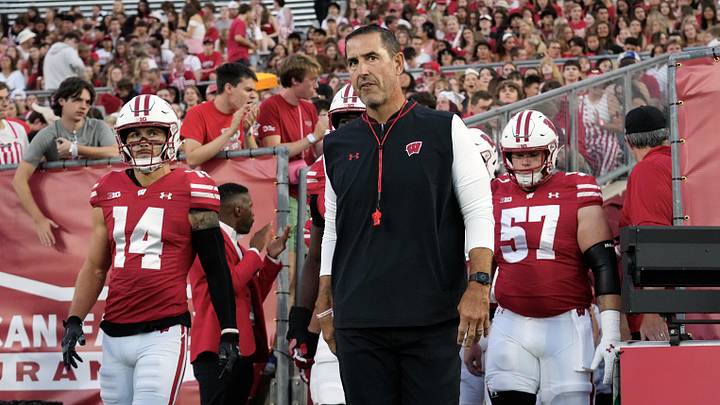 Aug 28, 2025; Madison, Wisconsin, USA;  Wisconsin Badgers head coach Luke Fickell walks onto the field for warmups prior to the game against the Miami (OH) RedHawks at Camp Randall Stadium. Mandatory Credit: Jeff Hanisch-Imagn Images
