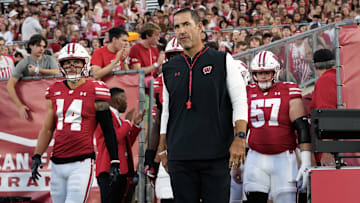 Aug 28, 2025; Madison, Wisconsin, USA;  Wisconsin Badgers head coach Luke Fickell walks onto the field for warmups prior to the game against the Miami (OH) RedHawks at Camp Randall Stadium. Mandatory Credit: Jeff Hanisch-Imagn Images