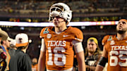 Texas Longhorns quarterback Arch Manning (16) walks off the field after UT defeats the Clemson Tigers in the CFP National Playoff first round game at Darrell K Royal-Texas Memorial Stadium.