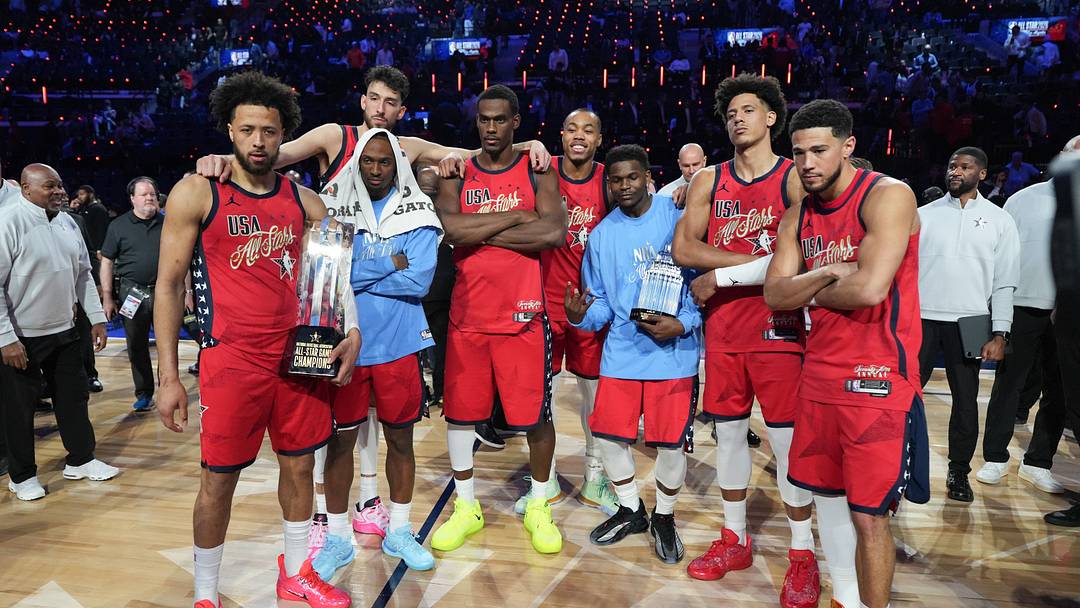 Feb 15, 2026; Inglewood, California, USA; Team USA Stars players, forward Scottie Barnes of the Toronto Raptors (4), guard Devin Booker of the Phoenix Suns (1), guard Cade Cunningham (2)and center Jalen Duren (0) of the Detroit Pistons, guard Anthony Edwards of the Minnesota Timberwolves, center Chet Holmgren of the Oklahoma City Thunder (7), forward Jalen Johnson of the Atlanta Hawks and guard Tyrese Maxey of the Philadelphia 76ers (0), pose for a photo after winning the All Star Championships