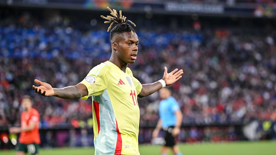 Nico Williams with arms outstretched.