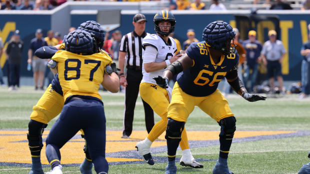 West Virginia University redshirt sophomore quarterback Nicco Marchiol drops back to pass during the 2024 Gold-Blue Spring Game.