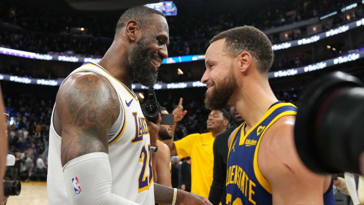 Jan 27, 2024; San Francisco, California, USA; Los Angeles Lakers forward LeBron James (left) and Golden State Warriors guard Stephen Curry (right) greet each other after the game at Chase Center. Mandatory Credit: Darren Yamashita-USA TODAY Sports