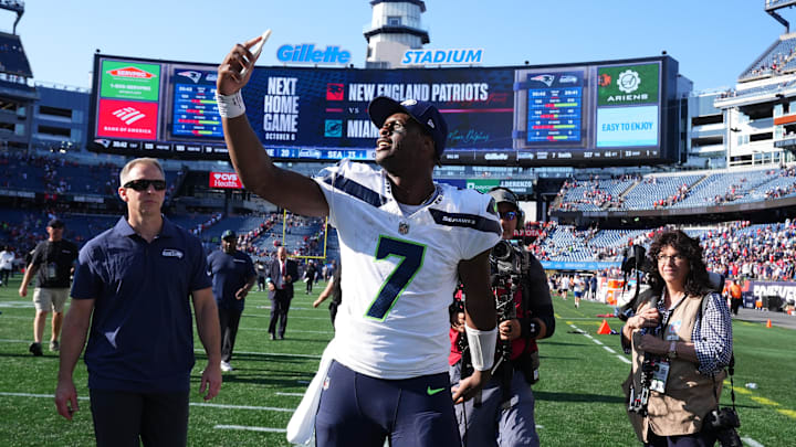 Sep 15, 2024; Foxborough, Massachusetts, USA; Seattle Seahawks quarterback Geno Smith (7) on a video call after defeating the New England Patriots at Gillette Stadium.