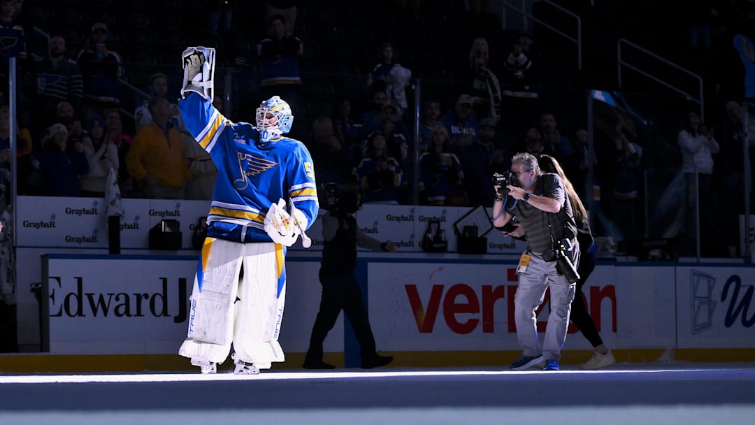 Nov 11, 2025; St. Louis, Missouri, USA; St. Louis Blues goaltender Jordan Binnington (50) salutes the fans after he was named first star of the game in a victory over the Calgary Flames at Enterprise Center. Mandatory Credit: Jeff Curry-Imagn Images