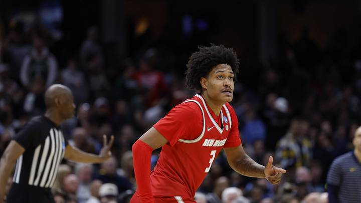 Mar 21, 2025; Cleveland, OH, USA; New Mexico Lobos guard Tru Washington (3) reacts in the second half against the Marquette Golden Eagles during the NCAA Tournament First Round at Rocket Arena. Mandatory Credit: Rick Osentoski-Imagn Images