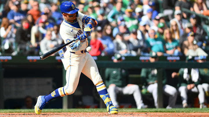Seattle Mariners center fielder Julio Rodriguez hits a single against the Oakland Athletics on Sept. 29 at T-Mobile Park. Seattle Mariners center fielder Julio Rodriguez hits a single against the Oakland Athletics on Sept. 29 at T-Mobile Park.
