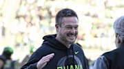 Nov 22, 2025; Eugene, Oregon, USA; Oregon Ducks head coach Dan Lanning smiles before the game against the Southern California Trojans at Autzen Stadium. 