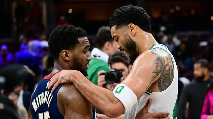 Mar 8, 2026; Cleveland, Ohio, USA; Cleveland Cavaliers guard Donovan Mitchell (45) talks to Boston Celtics forward Jayson Tatum (0) after the game at Rocket Arena. Mandatory Credit: Ken Blaze-Imagn Images