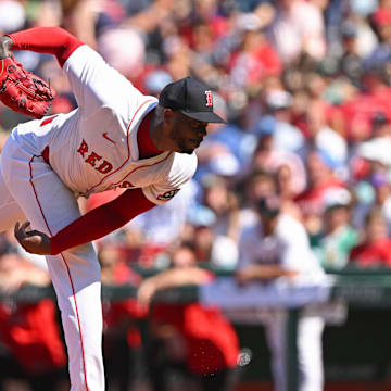Boston, Massachusetts, USA; Boston Red Sox pitcher Aroldis Chapman (44) pitches against the Tampa Bay Rays during the ninth inning  at Fenway Park.