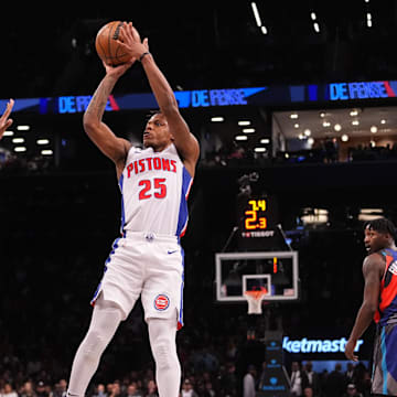 Apr 6, 2024; Brooklyn, New York, USA; Detroit Pistons guard Marcus Sasser (25) shoots a jump shot against Brooklyn Nets forward Noah Clowney (21) during the first half at Barclays Center. Mandatory Credit: Gregory Fisher-Imagn Images