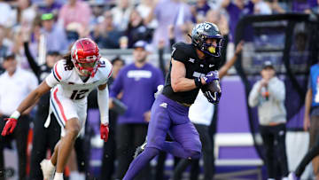 Nov 23, 2024; Fort Worth, Texas, USA; TCU Horned Frogs wide receiver JP Richardson (7) runs for touchdown against the Arizona Wildcats in the second half at Amon G. Carter Stadium. Mandatory Credit: Tim Heitman-Imagn Images